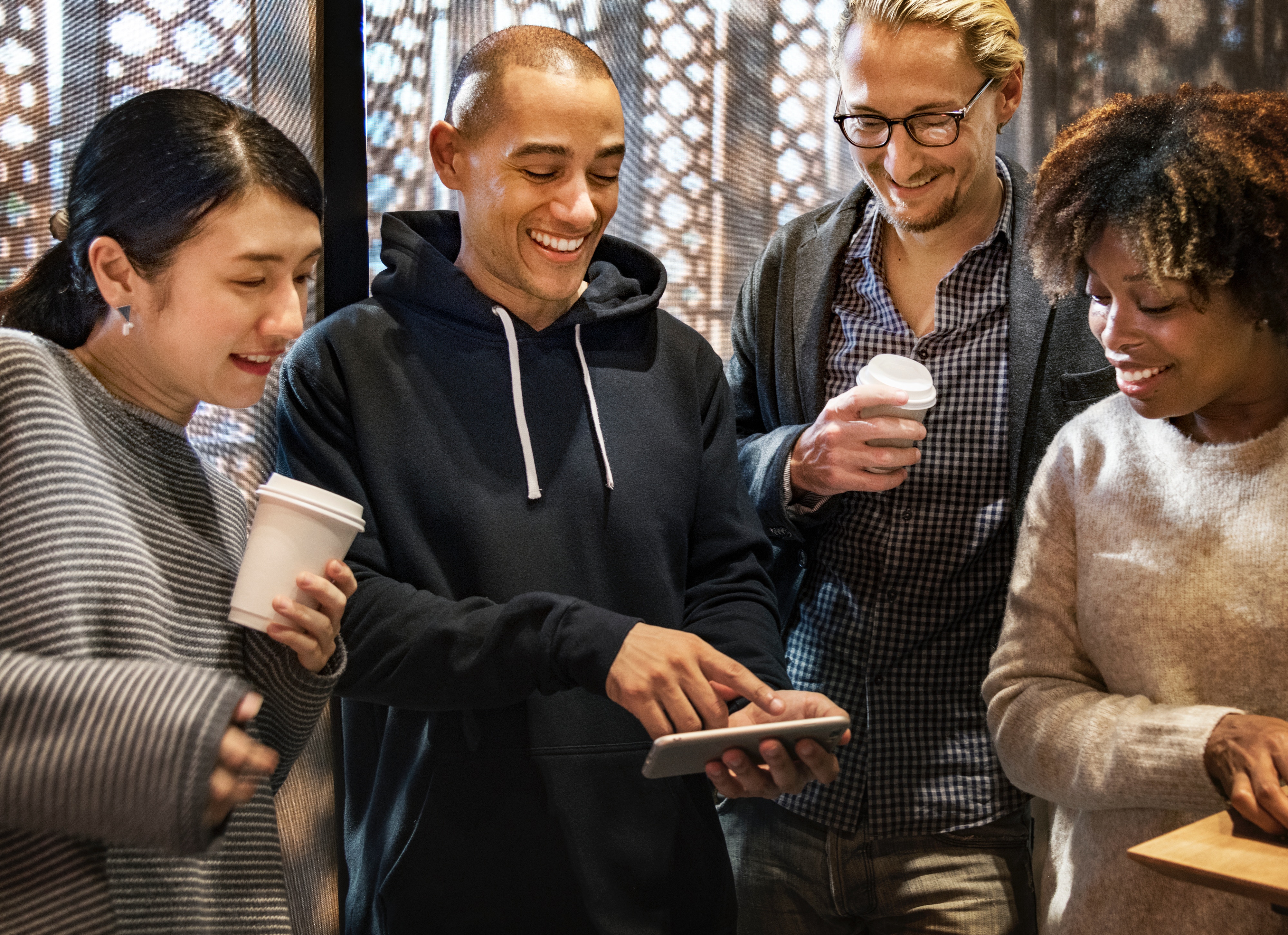 Four people talking to each other