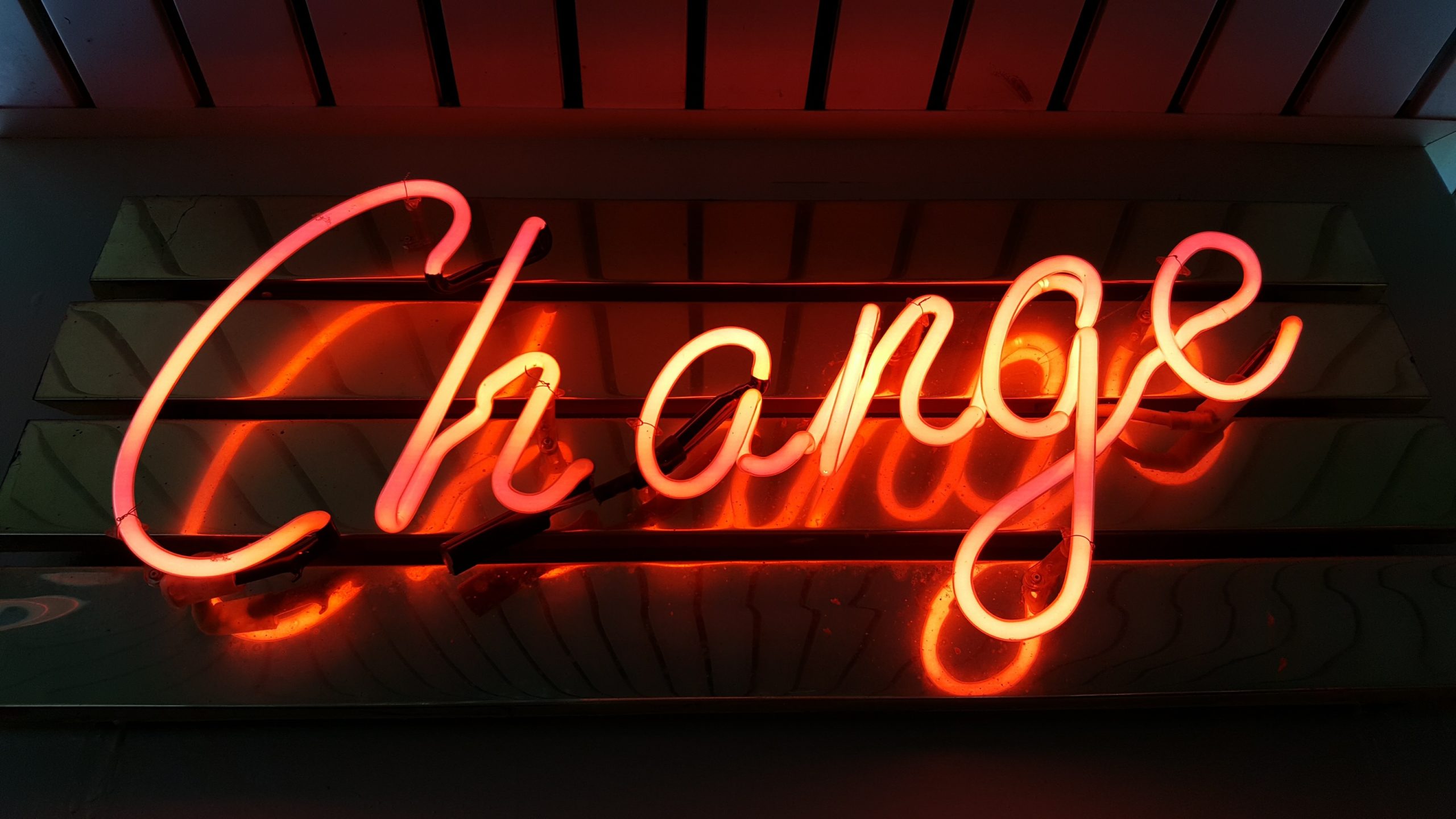 Neon sign that reads "Change"